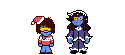 Kris and Susie standing together in their holiday outfits.